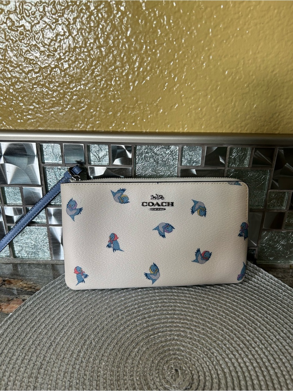 COACH Ivory Wristlet with Blue and Pink Bird Print